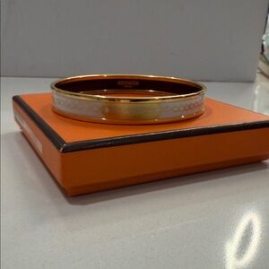 Hermès Gold and White Bangle Bracelet